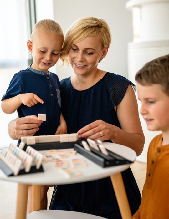 Happy child kids group have fun and play at kindergarden